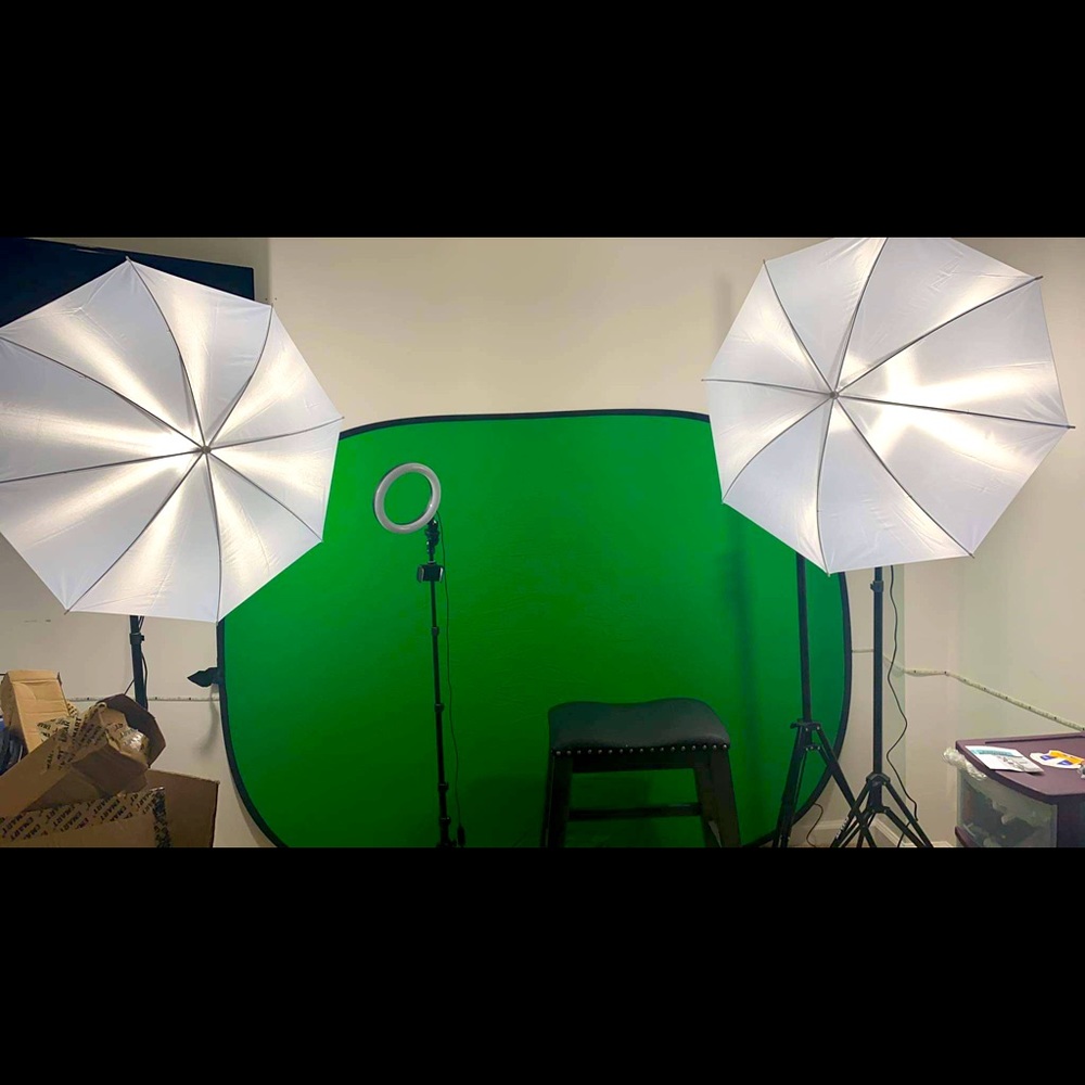 Small photo studio set up with green screen